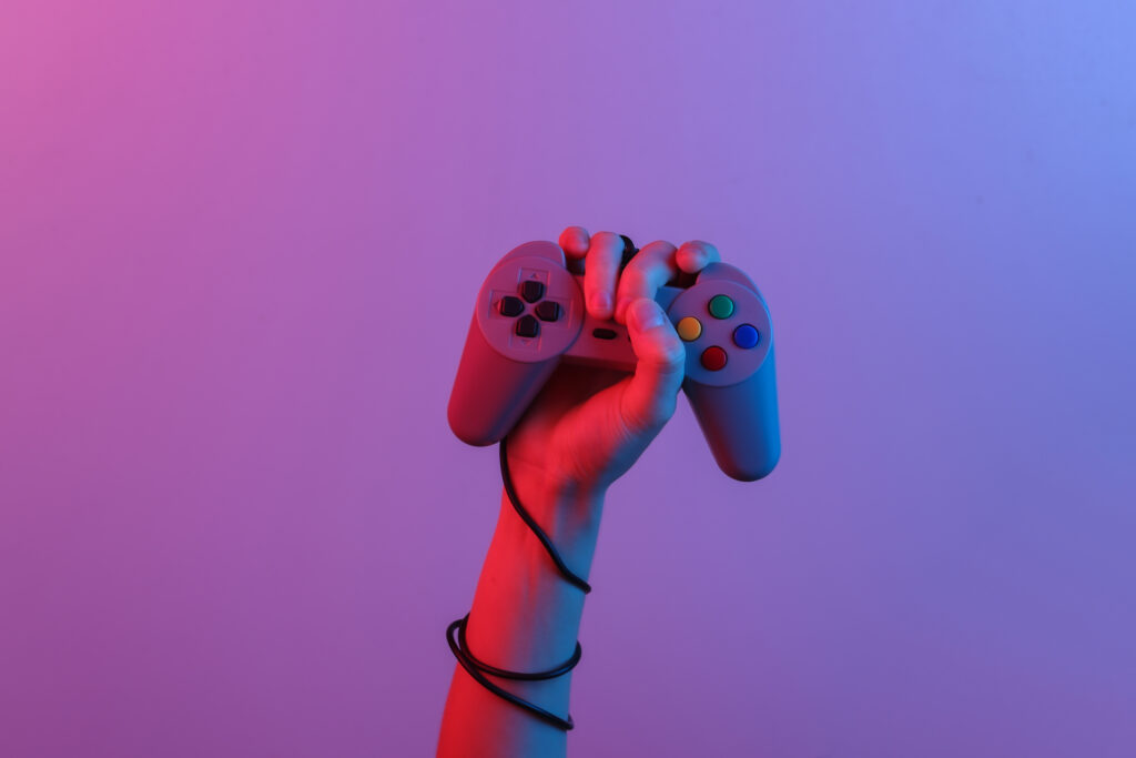 hands-holding-retro-joystick-blue-red-neon-gradient-light-old-gaming-80s-retro-wave-minimalism (3)